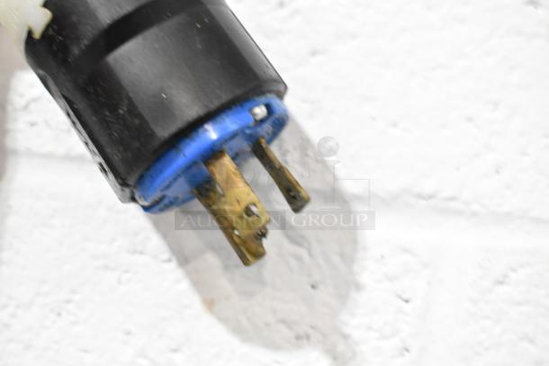 Power plug for Roundup VCT-2000CS toaster, showing metal prongs and sturdy casing. 208V, 1 Phase suitable.
