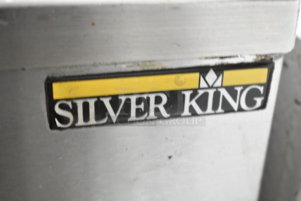 Silver King stainless steel commercial chest freezer label. Features 115 volts, 1 phase, and commercial casters.