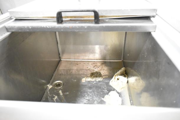 Silver King stainless steel commercial chest freezer on casters, interior view, 115 volts, 1 phase, clean condition.