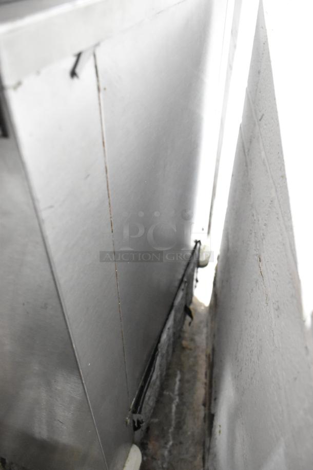 Silver King stainless steel commercial chest freezer on casters, 115 volts, 1 phase, in used condition.