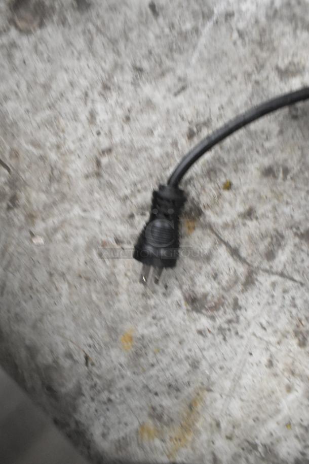 Electrical plug of Silver King Stainless Steel Commercial Chest Freezer, 115 Volts, 1 Phase, showing standard plug features.