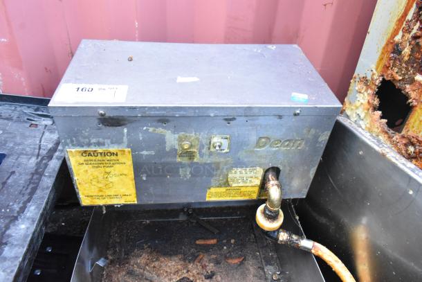 Dean Stainless Steel Commercial Fryer Oil Filtration System, visible wear, caution label, switch, power indicator, branded logo.