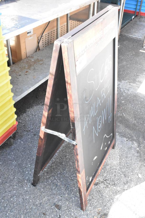 Wood pattern A-frame sidewalk sign with decorative chalk message. Features sturdy hinges and a rustic finish.