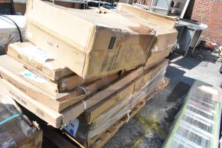 Pallet of 11 brand new scratch and dent items including Regency stainless steel table. Damaged boxes.