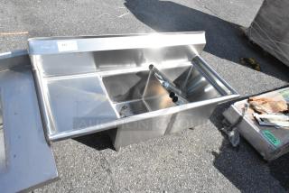 Brand new KoolMore SB151512-15L3 stainless steel 2-bay sink with left side drain board, scratch and dent condition.