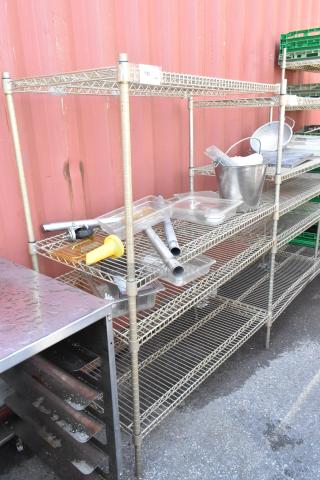 Chrome finish 4-tier wire shelving unit with assorted items. Buyer must dismantle. Consider freight charges.