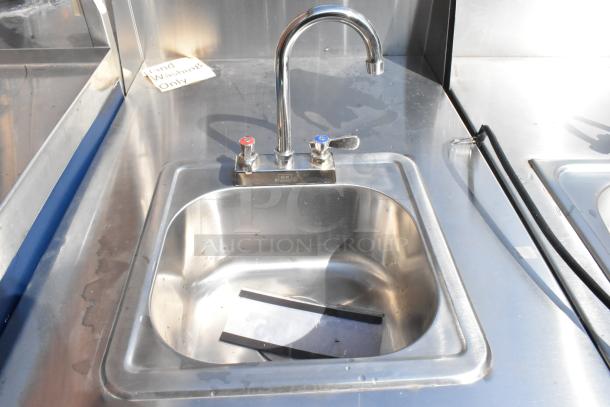 QualServ stainless steel commercial portable sink with faucets, on commercial casters. Includes "Hand Washing Only" sign.