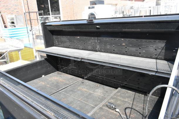Killion PFW-74-43-56-V-N-MOBILE metal open merchandiser; features shelves and wiring; used condition; 208/230V, 1 Phase.