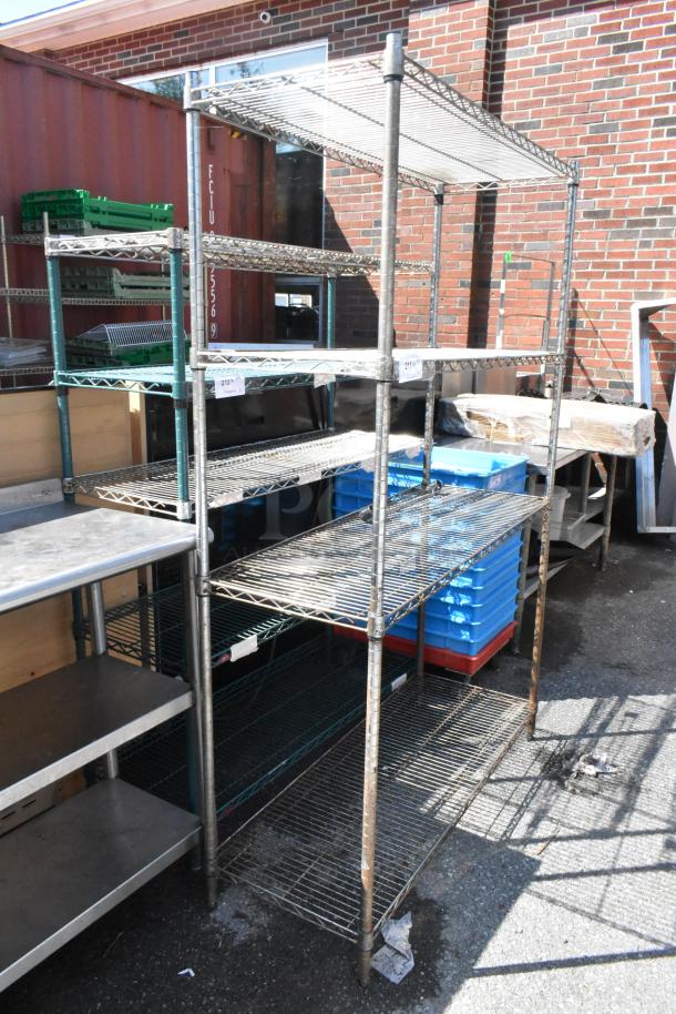 Chrome Finish 4 Tier Wire Shelving Unit. BUYER MUST DISMANTLE. PCI CANNOT DISMANTLE FOR SHIPPING. PLEASE CONSIDER FREIGHT CHARGES. - Image 1 of 6
