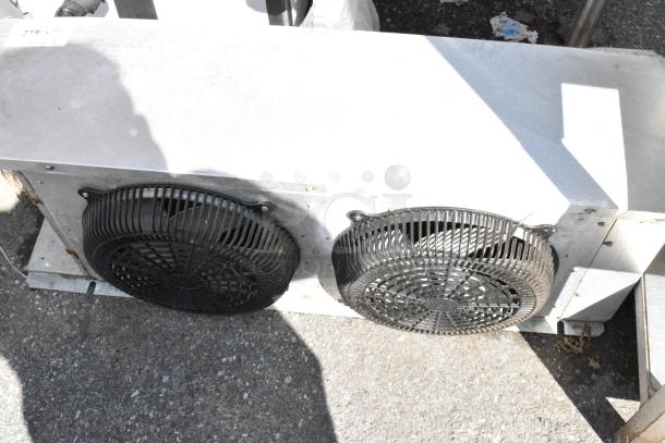 HTA28-97B-A700 metal evaporator fan with dual grills, 115V, 1 phase. Used condition, ideal for refrigeration systems.