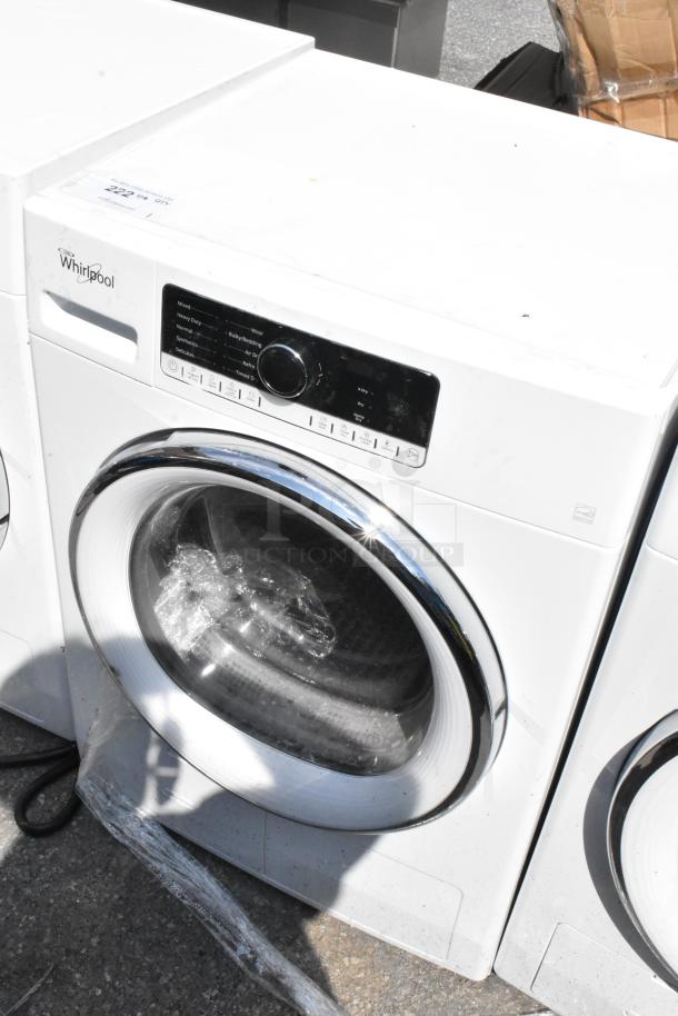 Whirlpool metal front load dryer, white, digital control panel, chrome door, model shown in good condition, slight surface wear.