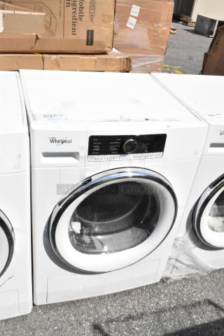 Whirlpool metal front load dryer, white, digital controls, sleek design, good condition, visible Whirlpool logo.
