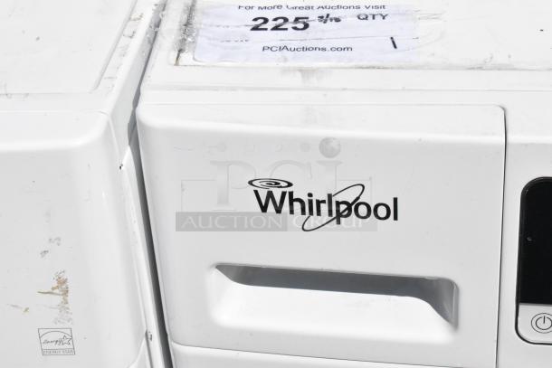 Whirlpool metal front load dryer, white, features Energy Star label. Some visible wear. Auction number tag: 225.