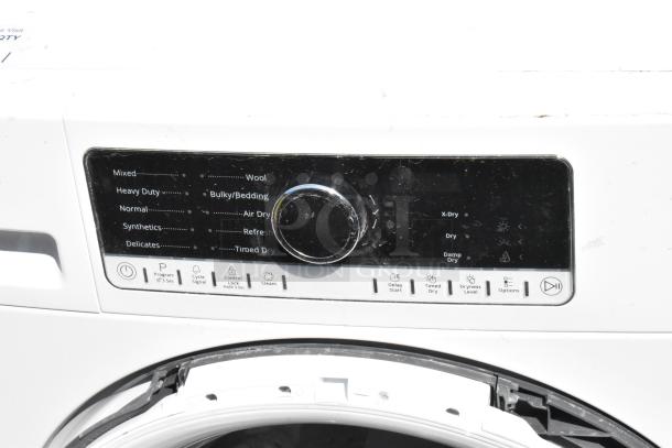 Whirlpool front load metal dryer with various cycle options on control panel. Slight wear visible.