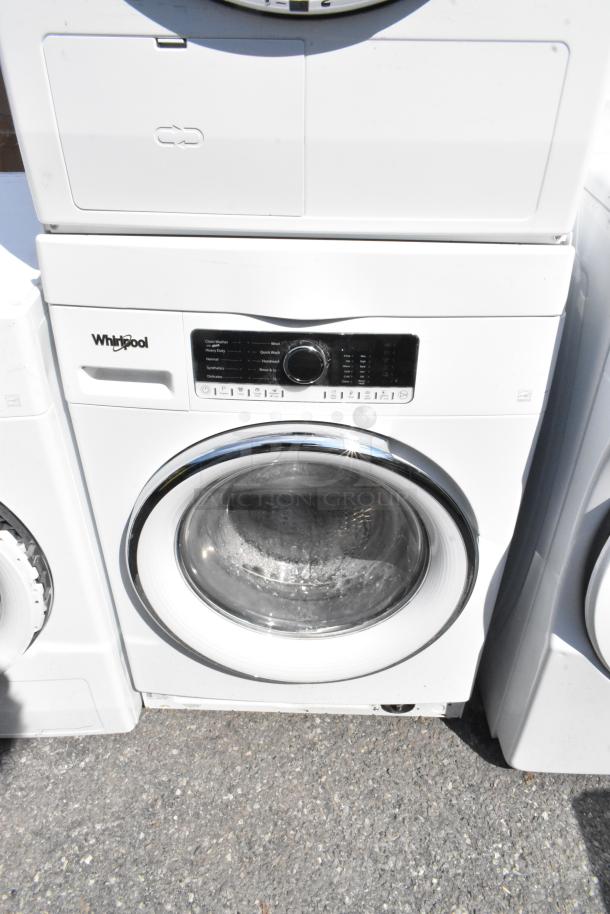 Whirlpool front load washer and dryer, white metal finish, model WFW5090JW0, 120 volts, 1 phase, in used condition.