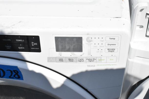 Whirlpool WHD560CHW1 metal front load washer, digital display, control buttons visible, 120/208-240 volts, 1 phase.