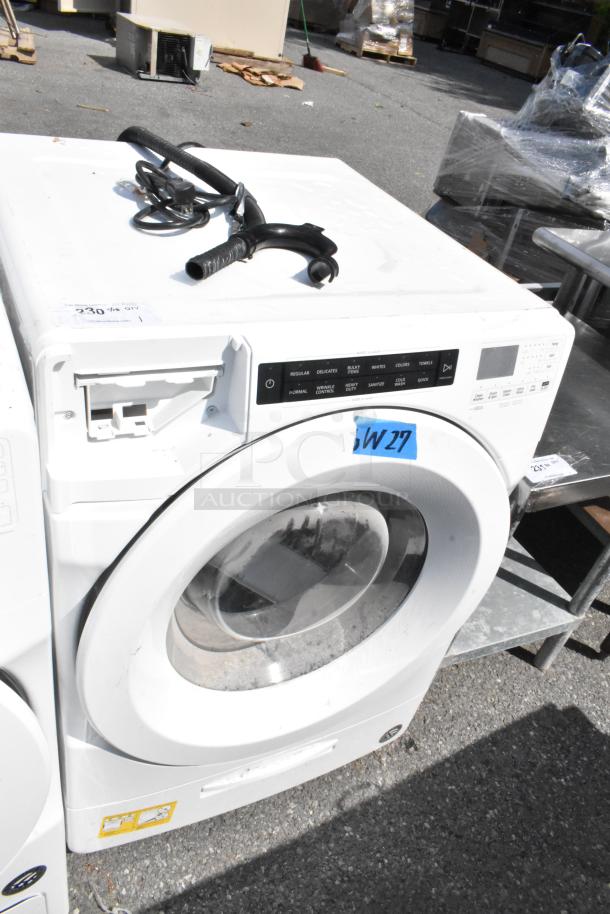 Whirlpool WFW5620HW2 front load washer with control panel, visible cords, and open detergent drawer; 120 Volts, 1 Phase.