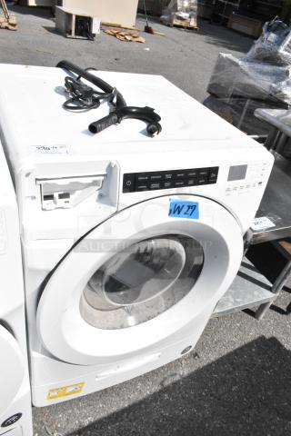 Whirlpool WFW5620HW2 front load washer with control panel, visible cords, and open detergent drawer; 120 Volts, 1 Phase.