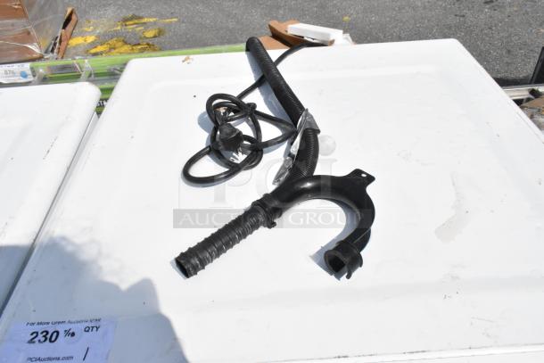 Whirlpool WFW5620HW2 front load washer top, showing hoses and power cord. Includes auction label "230" from PCI Auctions.