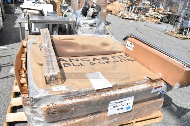 13 brand new scratch and dent items, including Lancaster Table & Seating 60" round granite table on a pallet.