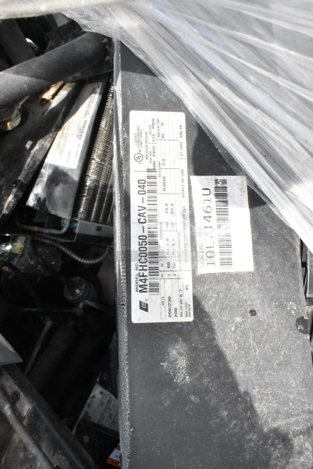 19 compressors including Copeland brand, model M4FHC0050-CAV-040, serial 10L71461U, in used condition.