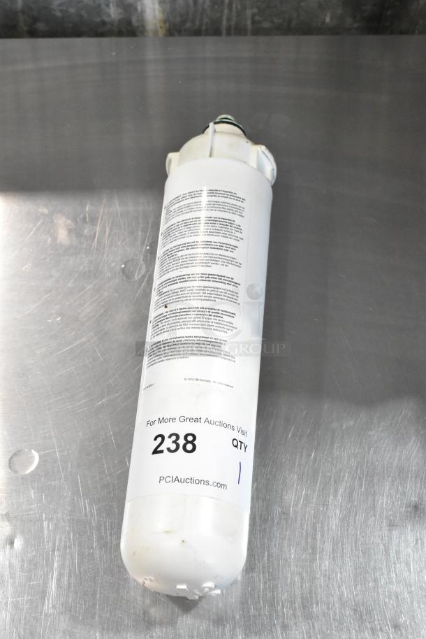 3M Water Filtration Cartridge in good condition; features product details and auction label with "238 QTY" marking.