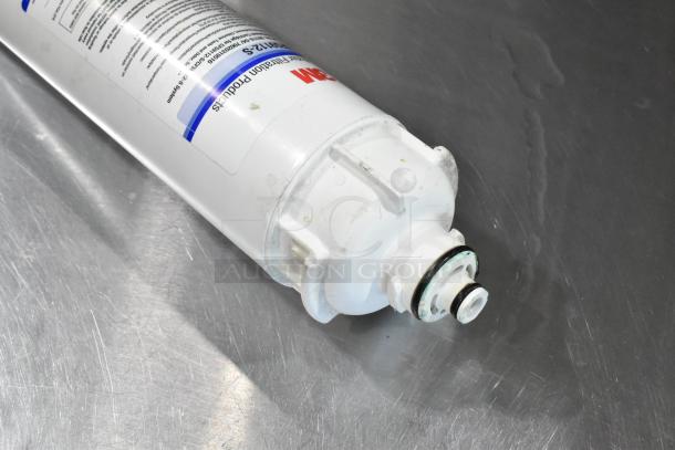 3M Water Filtration Cartridge, slightly used, with visible label detailing specifications and model number on the side.