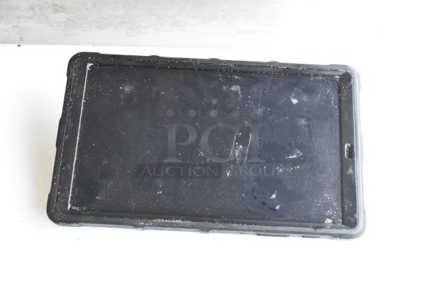 Five various tablets, including a Lenovo TB-8505F, shown in used condition with visible wear and scratches.