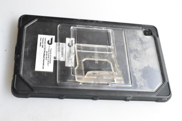 Five assorted tablets, including a Lenovo TB-8505F, featured in rugged cases with visible usage marks and security stickers.
