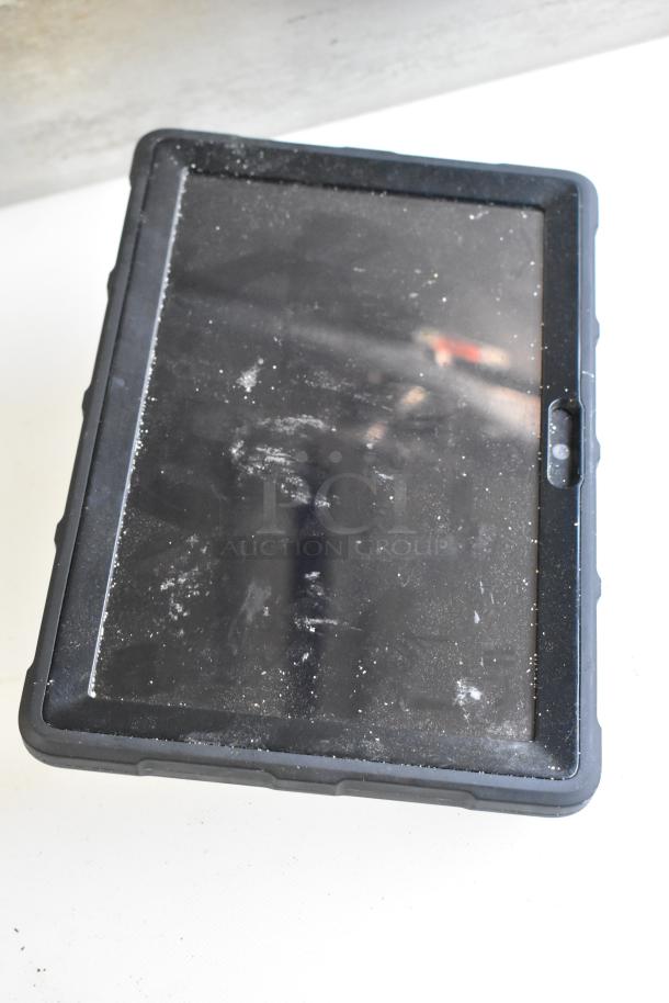 Five tablets including Lenovo TB-8505F, visible wear, touchscreen with dust, black bezels, sold as auction lot.