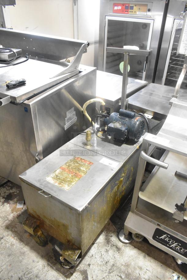 Metal commercial portable fryer oil filter, model 402. 120 volts, 1 phase. Visible wear, mounted on casters for mobility.