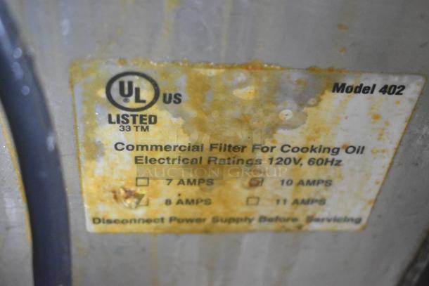 "Model 402 Metal Commercial Portable Fryer Oil Filter, UL listed, 120V, 60Hz, visible wear on label, 1 Phase."