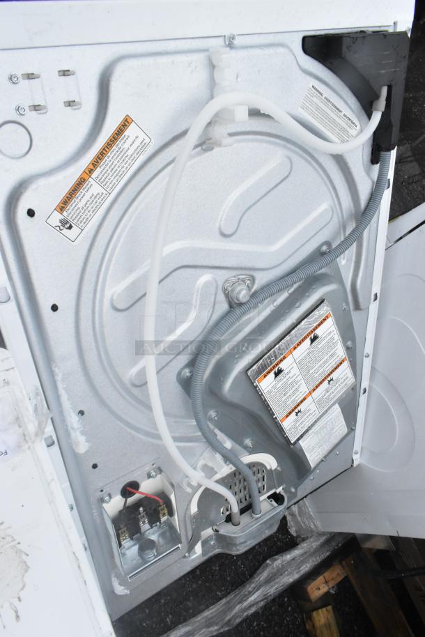 Whirlpool metal front load dryer, 125/250 volts, features visible wiring and warning labels, suggesting electrical specifications.