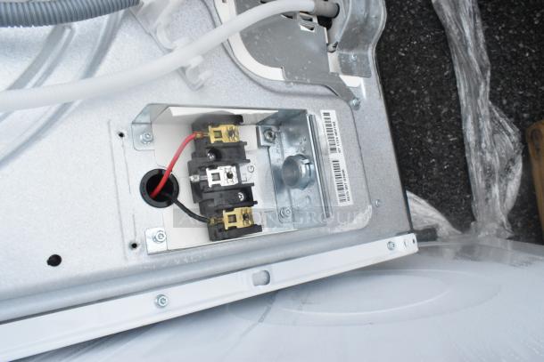 Whirlpool metal front load dryer, 125/250 volts, open panel view showing wiring and electrical connections.