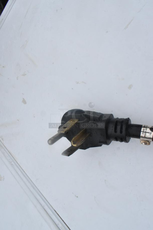 Power plug of a Whirlpool Metal Front Load Dryer, suitable for 125/250 volts. Appears in used condition.