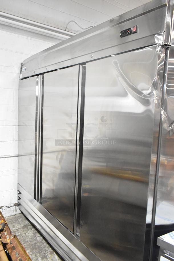 Brand new 2025 Avantco 178SS3FHC stainless steel 3-door reach-in freezer with poly coated racks; minor dents visible.