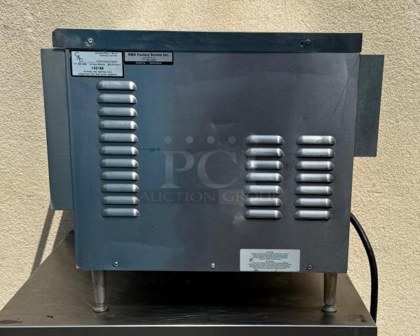 TurboChef NGC Tornado ventless oven, model 15, stainless steel, vented side view, visible labels for service info.