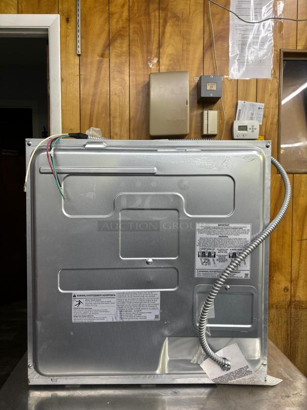 BRAND NEW Samsung 24" Single Electric Wall Oven, Convection, Wi-Fi, Stainless Steel. Model NV31T4551SS, rear view showing wiring.