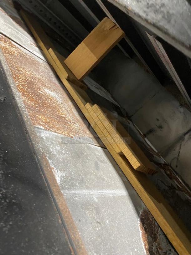 Marsal & Sons MB60 pizza oven interior with visible rust and wooden planks. Natural gas powered, commercial grade.