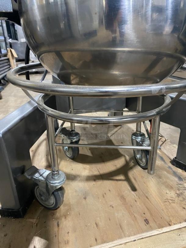 Avantco 60 Qt. Floor Mixer with electric lift, stainless steel bowl, cast aluminum dough hook, and mobile cart on casters. Model 177MX60H.
