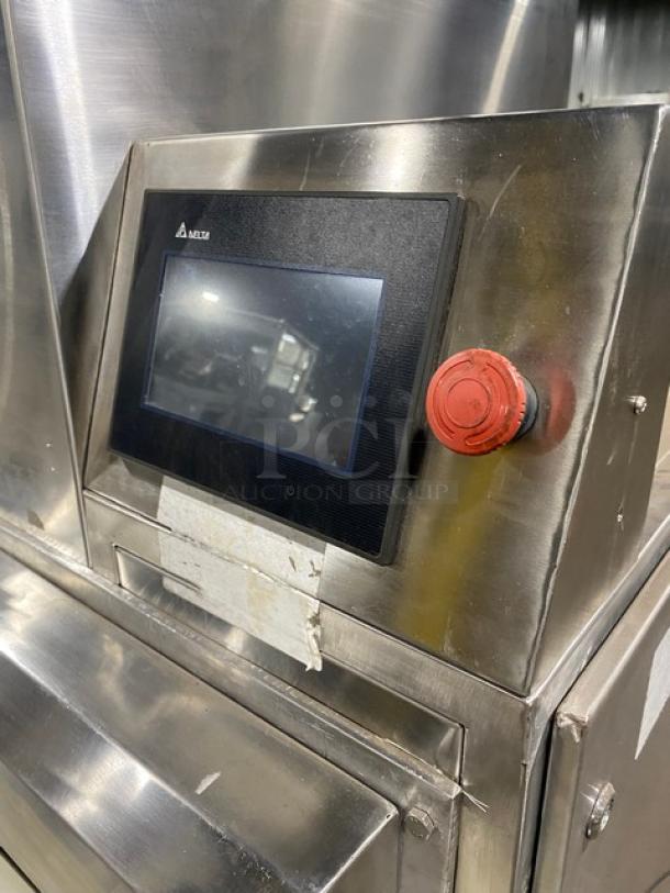 Aksar stainless steel electric tray aligning machine with built-in pan slides and casters, featuring a Delta control panel.