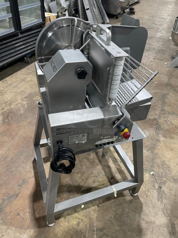 Jaccard VA2000GRT electric slicer with open base stand, 110V, model SN: 2176809, commercial use, on sturdy legs.