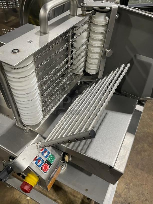 Jaccard VA2000GRT slicer with stainless steel blades, control panel, and open base stand. Model VA2000GRT, 110V. Clean condition.
