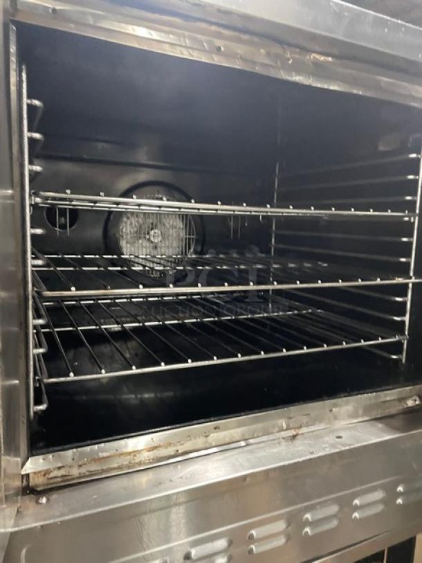 Blodgett SHO-100-G double stacked convection oven, stainless steel, thermostatic control, wired racks, on casters.
