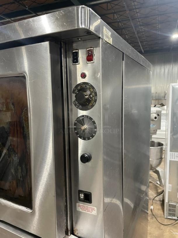Blodgett SHO-100-G double-stacked convection oven, stainless steel, natural gas, thermostatic control, wired racks, on casters.