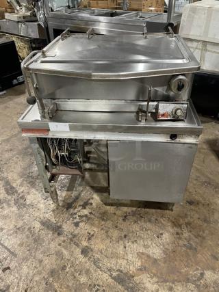 Market Forge stainless steel electric braising pan, Model 1600, 16 gal, tilt skillet, 208V 3 phase, on legs, visible wiring.