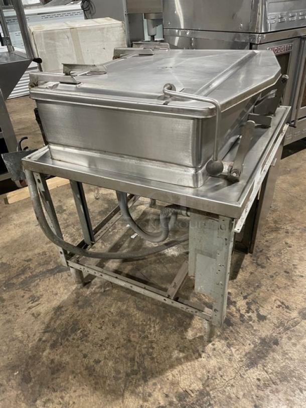 Market Forge 1600 16 Gal. stainless steel tilt braising pan. Electric, 208V 3 Phase, on legs. Model: 1600, SN: 089729.