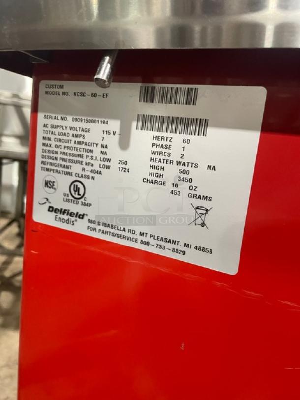 Delfield Shelleyglas red stainless steel 4-well cold food serving counter, Model KCSC60EF, serial number 0909150001194, on casters.