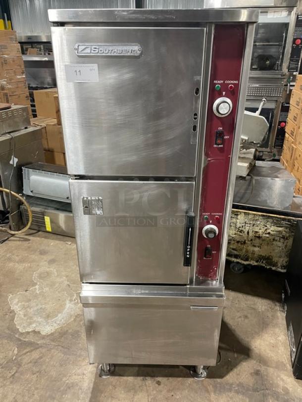 Southbend SX55EC commercial stainless steel dual compartment convection steamer, electric, with enclosed cabinet base, on legs.