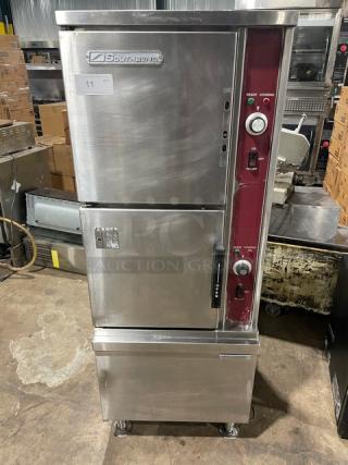 Southbend SX55EC commercial stainless steel dual compartment convection steamer, electric, with enclosed cabinet base, on legs.